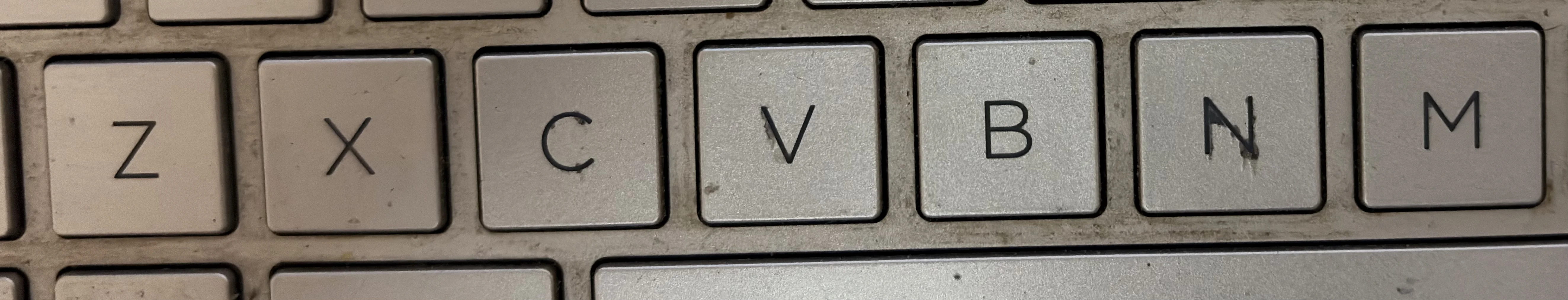 Bottom row keyboard keys ZXCVBNM